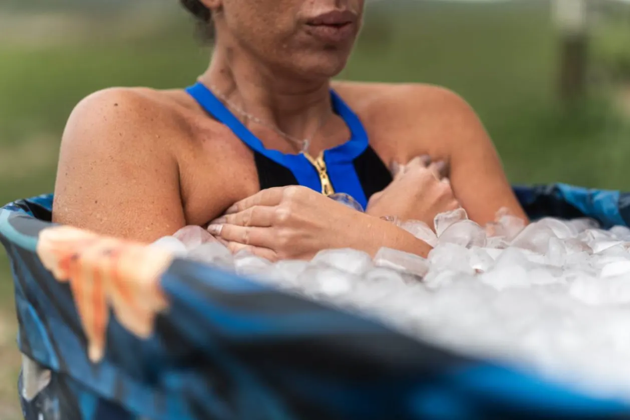 Woman in cold plunge tub